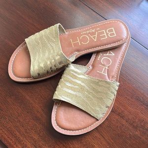 Barely worn golden zebra sandals size 8